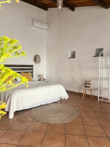 Cama o camas de una habitación en Is Scabas Guestrooms