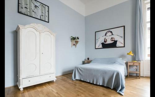 En eller flere senge i et værelse på BudapeStayz - Jozsef Apartments
