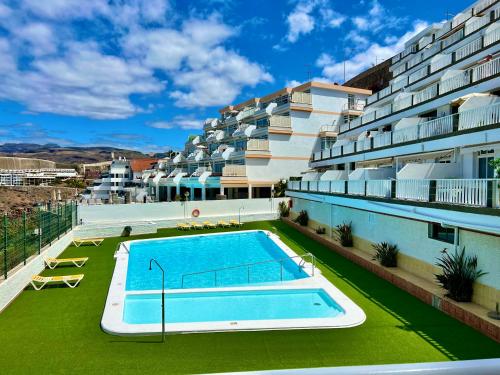 Swimmingpoolen hos eller tæt på Canarias Sunshine Amadores