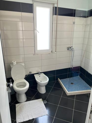 Un baño de Hakunna Matata Residence & Apartments