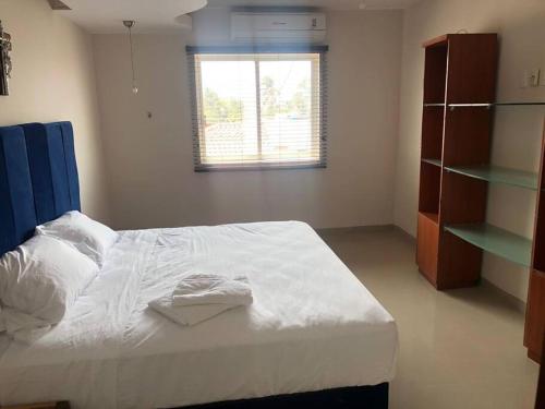 Postel nebo postele na pokoji v ubytování 8pers -6camas AC -Alberca-Playa 3min Playas Vicente fox