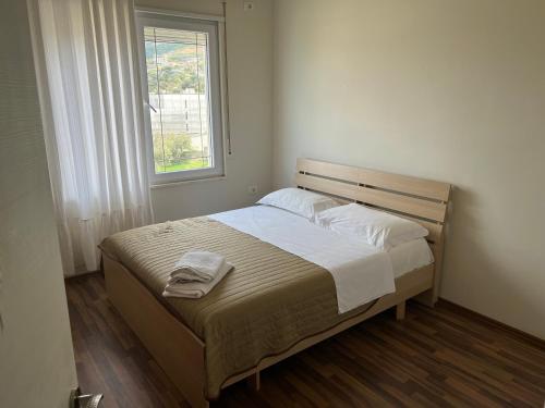 Una cama o camas en una habitación de Hakunna Matata Residence & Apartments