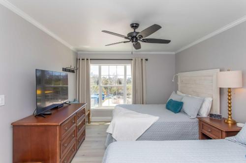 Ένα ή περισσότερα κρεβάτια σε δωμάτιο στο Summerhouse Villas Condo Private Resort Beach!