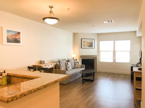 a living room with a couch and a table at Perfect Apt near UCLA w Parking Gym Pool WIFI in Westwood B3 in Los Angeles