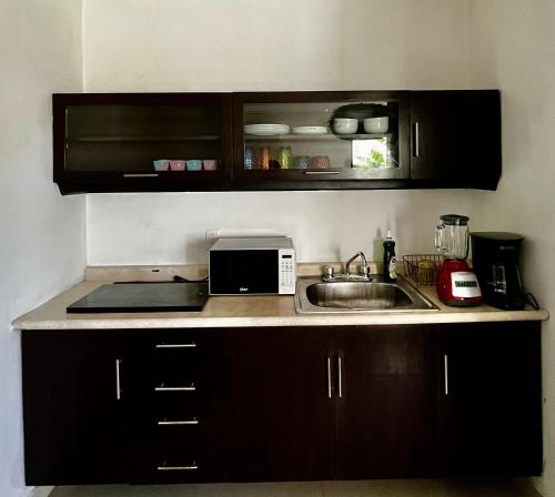 Cuisine ou kitchenette dans l'établissement Condominio en ZH Cancun