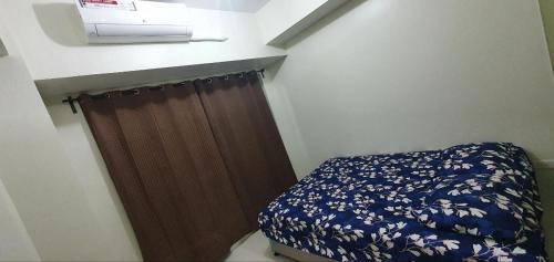 Voodi või voodid majutusasutuse 05-06 at Wind Residences Tagaytay toas