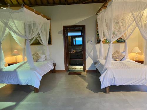Letto o letti in una camera di Sawah Indah Villa
