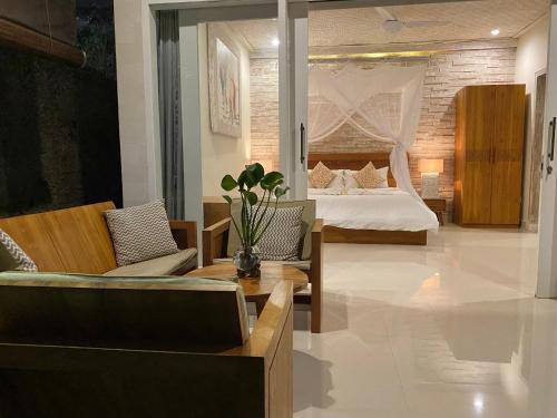 Letto o letti in una camera di Sawah Indah Villa