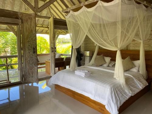 Letto o letti in una camera di Sawah Indah Villa