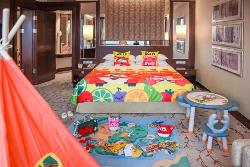 Ein Bett oder Betten in einem Zimmer der Unterkunft Futian Shangri-La, Shenzhen