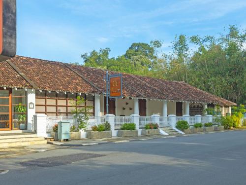 a building with a street in front of it at Heritage Boutique by Seven Angels in Kandy