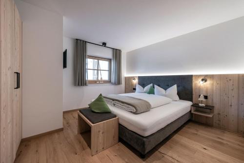 A bed or beds in a room at Mein Sonnenhof