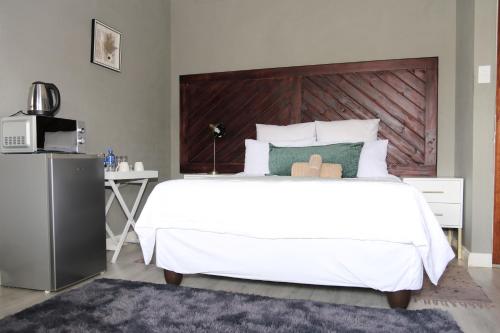 Katil atau katil-katil dalam bilik di Charis View Guest House