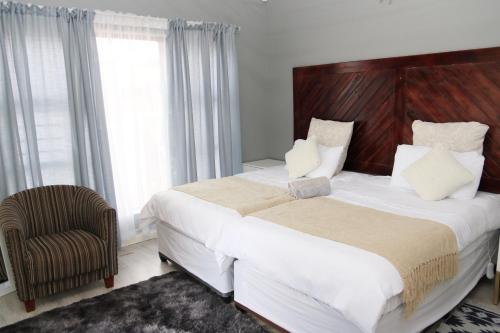 Katil atau katil-katil dalam bilik di Charis View Guest House