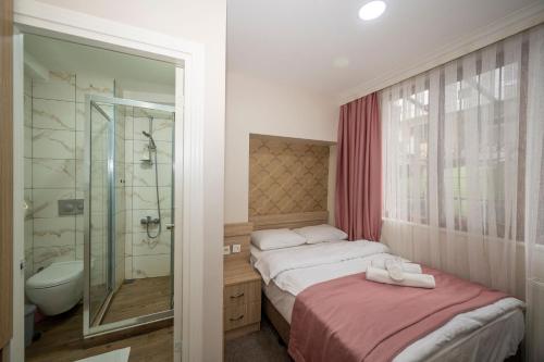 Koupelna v ubytování Hotel Melita