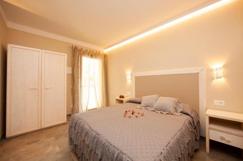 Postel nebo postele na pokoji v ubytování Podere Grandolfi B&B