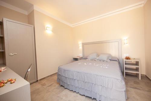 Postel nebo postele na pokoji v ubytování Podere Grandolfi B&B