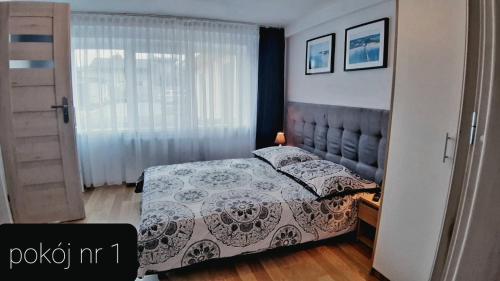 Posteľ alebo postele v izbe v ubytovaní Pokoje Gościnne Gąsowscy Dzieci od 12 roku życia