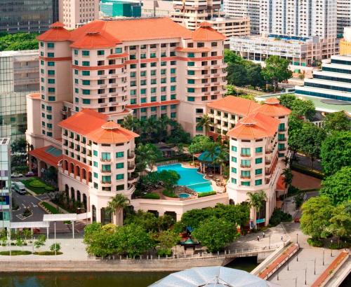 an aerial view of a city with tall buildings at Paradox Singapore Merchant Court at Clarke Quay in Singapore