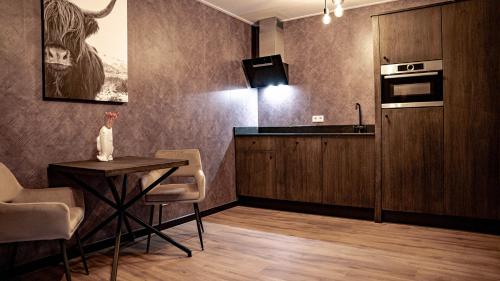 Hotel Biesboschにあるキッチンまたは簡易キッチン
