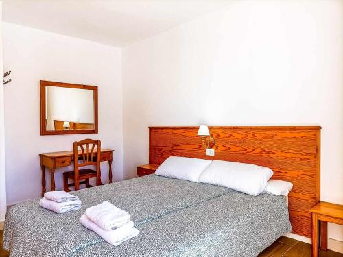 מיטה או מיטות בחדר ב-Rentaliday Flor de Cia