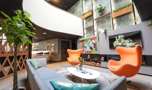 Ruang duduk di Le Magic Hôtel & Spa
