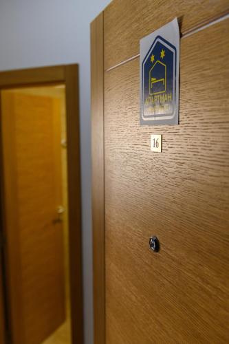 a door with a sign that reads apartment on it at Apartman Saga Premium Garaza Parking Vauceri Ne in Soko Banja