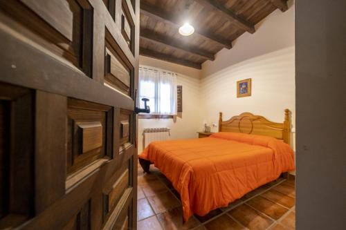 A bed or beds in a room at RuralEcofilabres