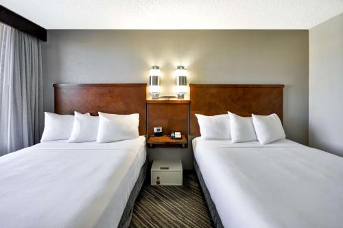 Un ou plusieurs lits dans un hébergement de l'établissement Hyatt Place Las Vegas