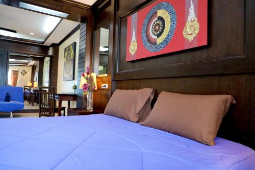 מיטה או מיטות בחדר ב-THOMLEK Guesthouse