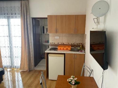 Η κουζίνα ή μικρή κουζίνα στο Apartments Plaza
