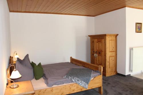 Ein Bett oder Betten in einem Zimmer der Unterkunft s' Berghäusl Randeck