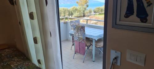 a view of a balcony with a table and chairs at Sea View apartment in Vlorë