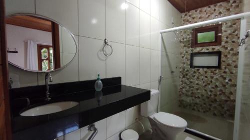 Et badeværelse på Recanto dos Pássaros - Sana Chalés