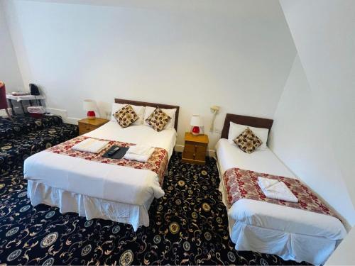 Katil atau katil-katil dalam bilik di Hotel Hudson