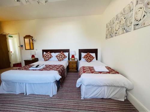 Katil atau katil-katil dalam bilik di Hotel Hudson