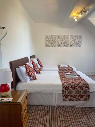 Katil atau katil-katil dalam bilik di Hotel Hudson