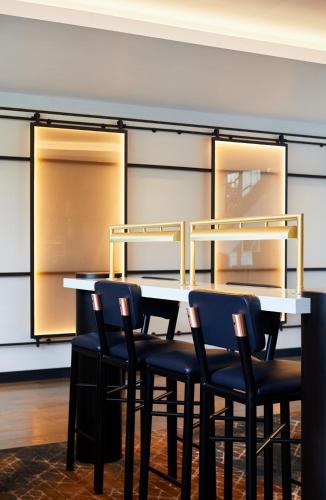 a conference room with a table and chairs at Hyatt Regency Manchester in Manchester