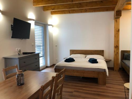 Postel nebo postele na pokoji v ubytování ANICO apartmány