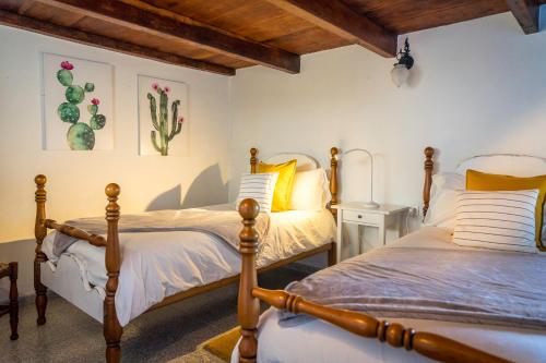 Ein Bett oder Betten in einem Zimmer der Unterkunft CASA DE ITA