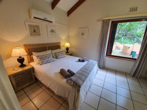 מיטה או מיטות בחדר ב-San Lameer Villa 2902