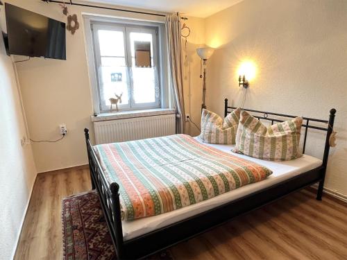 Ένα ή περισσότερα κρεβάτια σε δωμάτιο στο Ferienwohnung Ueckermünde VORP 2131
