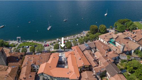 an aerial view of a town next to the water at Albergo Pesce D'oro in Verbania