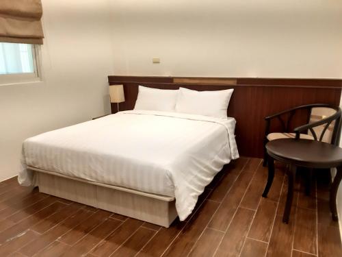 Postel nebo postele na pokoji v ubytování Yun Yan Inn