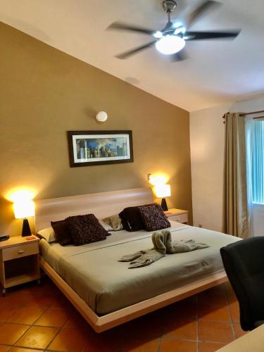 Ένα ή περισσότερα κρεβάτια σε δωμάτιο στο Casa Mi Tesoro