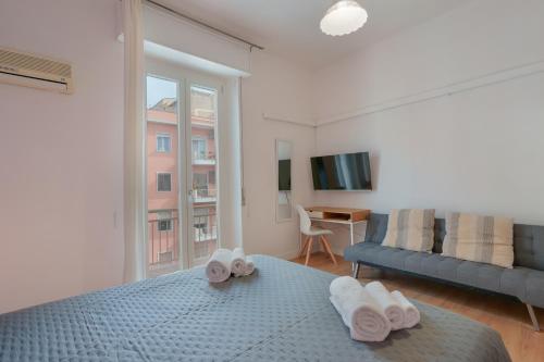 Postel nebo postele na pokoji v ubytování Bissenti Rooms - Eja Sardinia