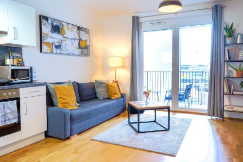 A seating area at Modern Apartment close to Congress Center, TU-Uni and Center with Netflix!