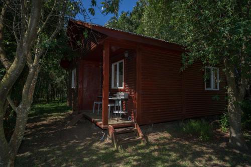 Un jardín fuera de Bordemundo B&B y Cabañas