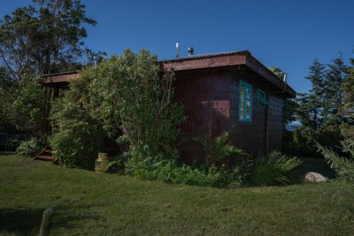 Un jardín fuera de Bordemundo B&B y Cabañas