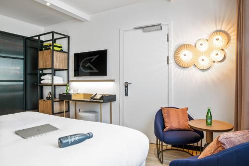 Golden Tulip Warszawa Centrumにあるテレビまたはエンターテインメントセンター